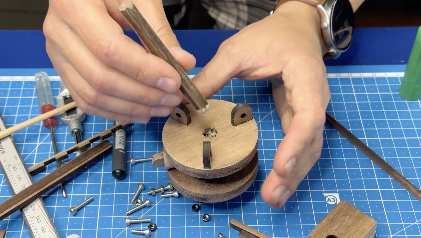 Foldable Wooden Tripod: installing the pivot hardware