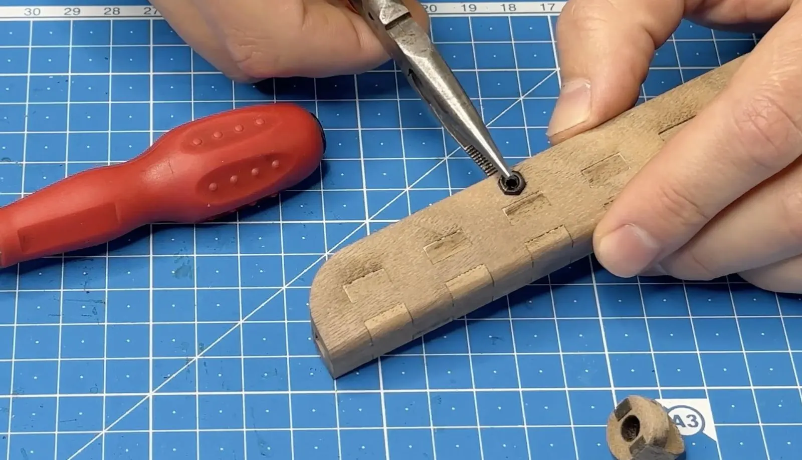 Foldable Wooden Tripod: drilling the camera-mount plate