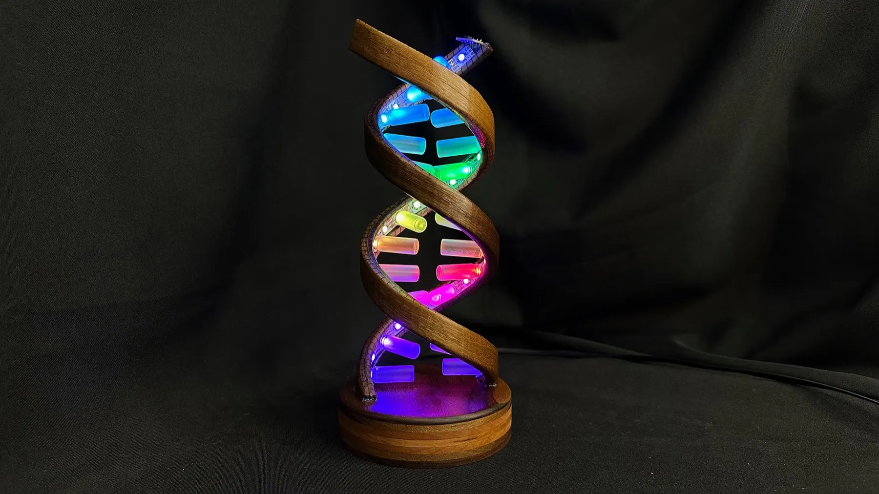 Gesture-Controlled DNA Lamp: finished DNA Lamp on its wooden base