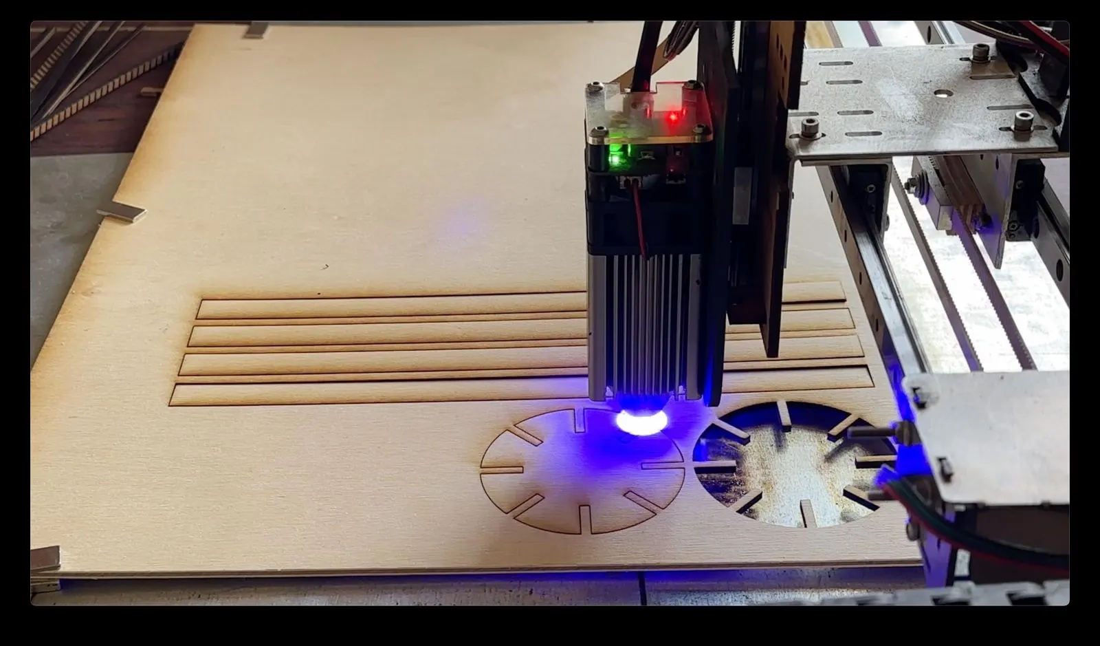 Gesture-Controlled DNA Lamp: laser cutting the bottle supports
