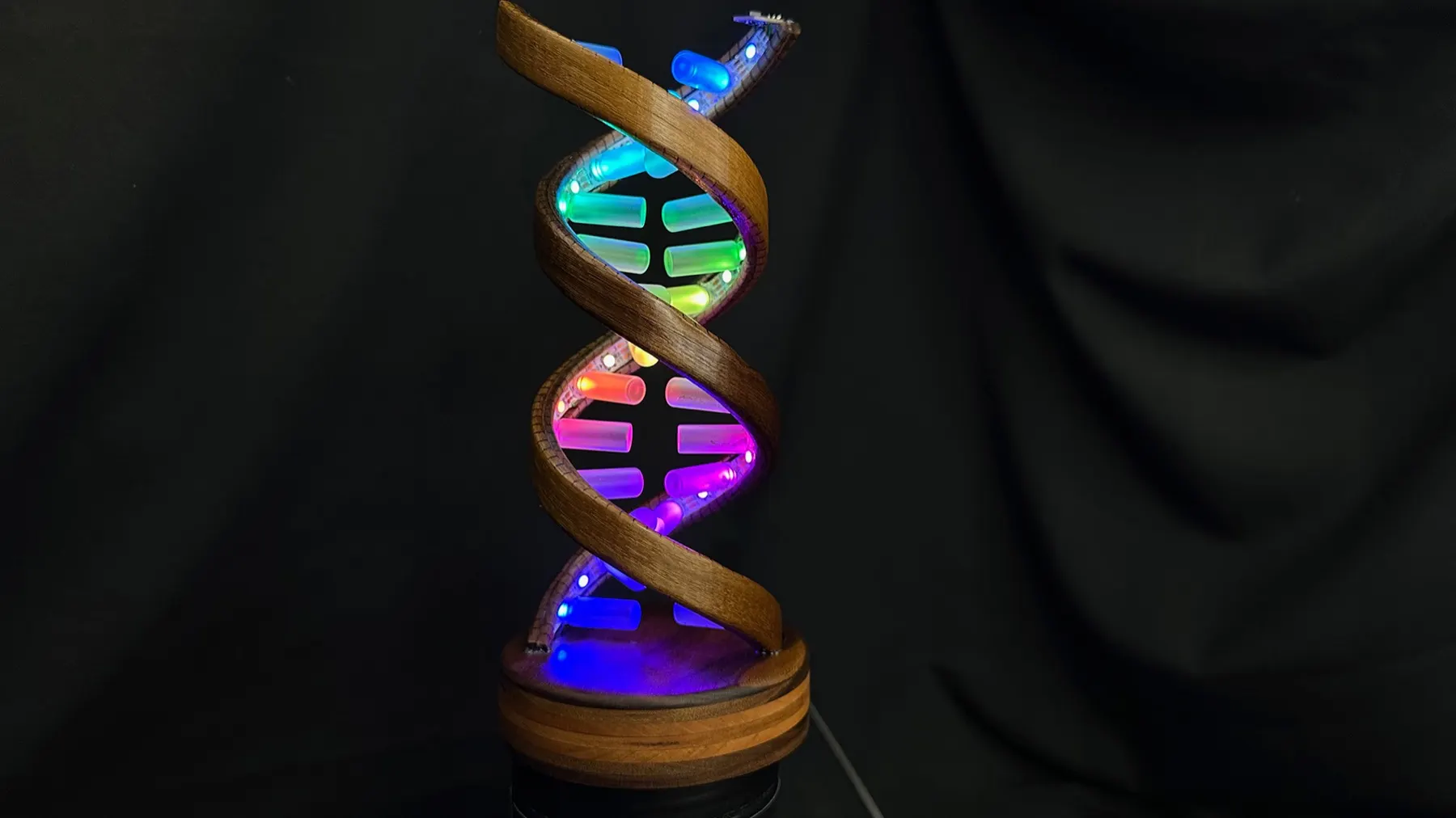 Gesture-Controlled DNA Lamp: blue-and-pink animation