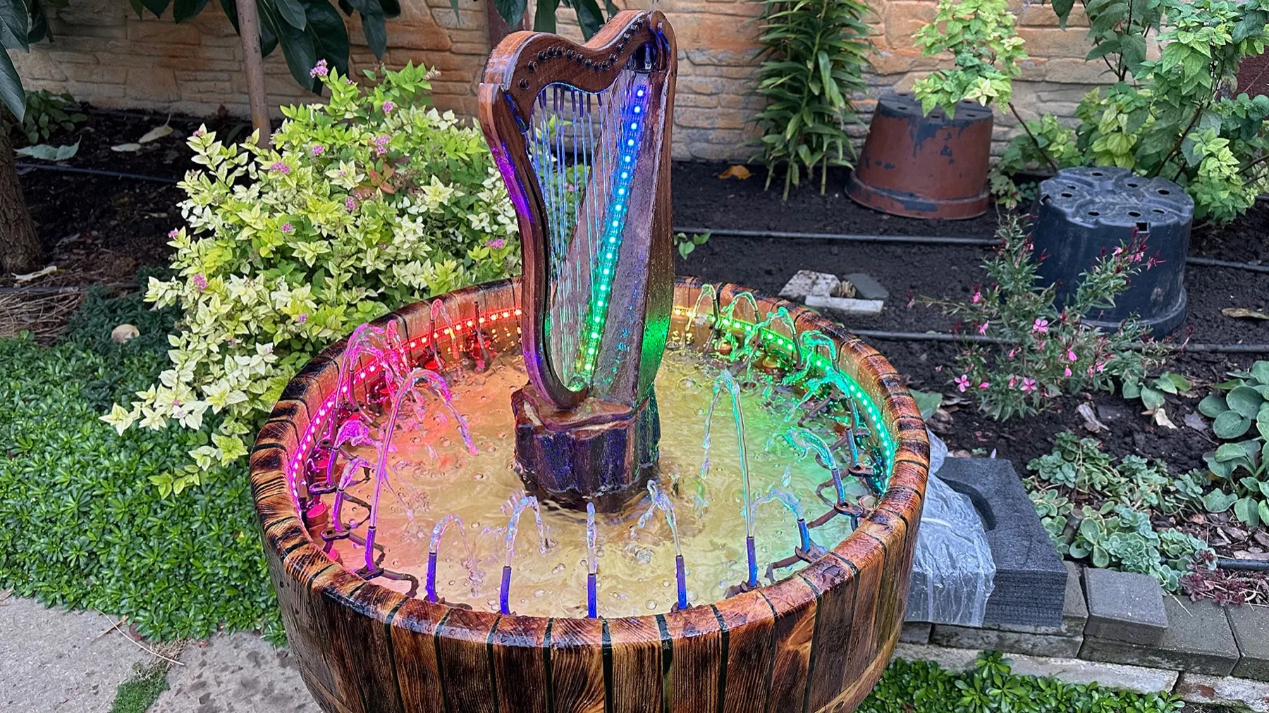 Animated Wooden Fountain: fountain installed in the garden