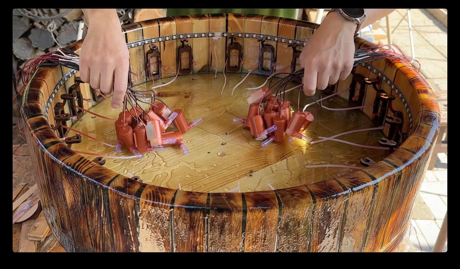 Animated Wooden Fountain: positioning the twenty-four mini pumps
