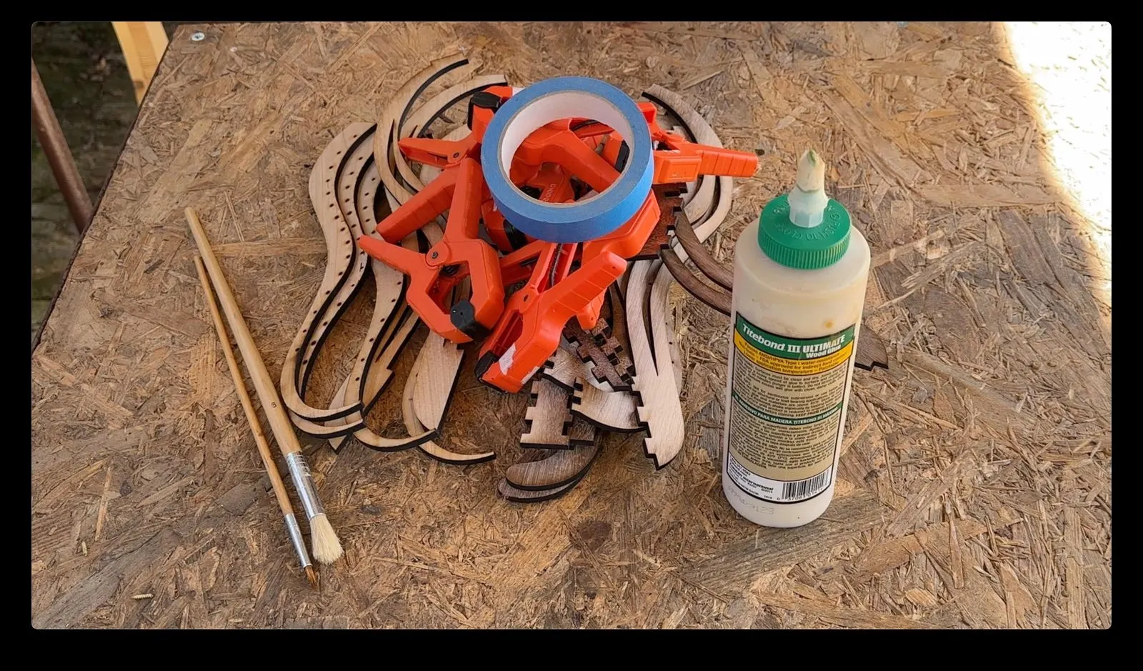 Animated Wooden Fountain: pump housings and tubing prepared for assembly