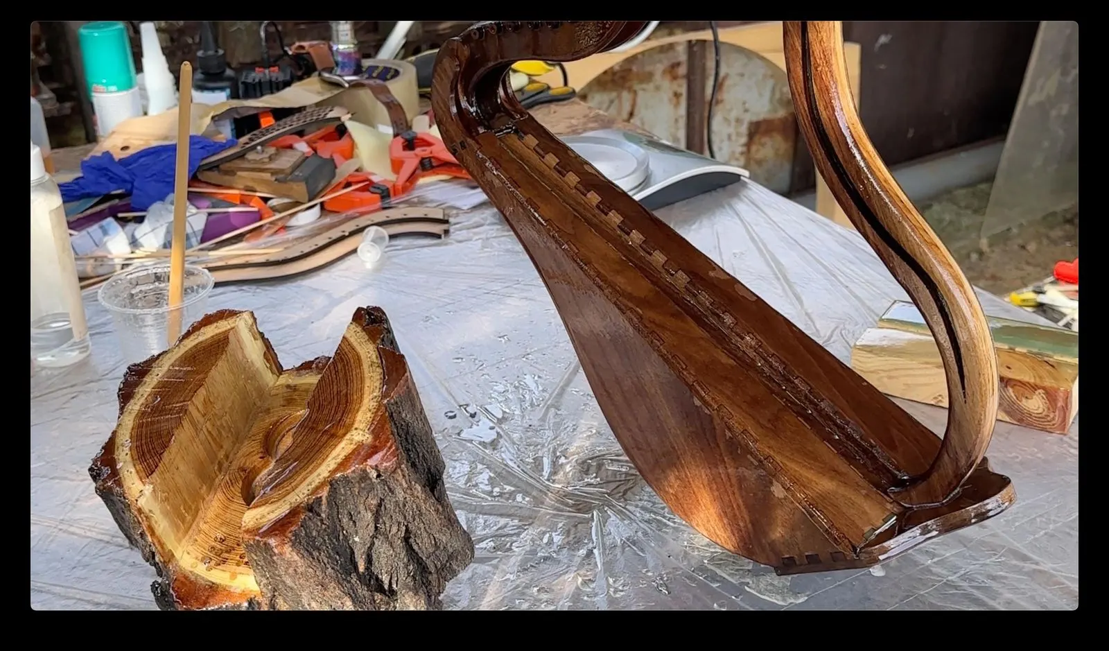 Animated Wooden Fountain: applying finish to the walnut harp