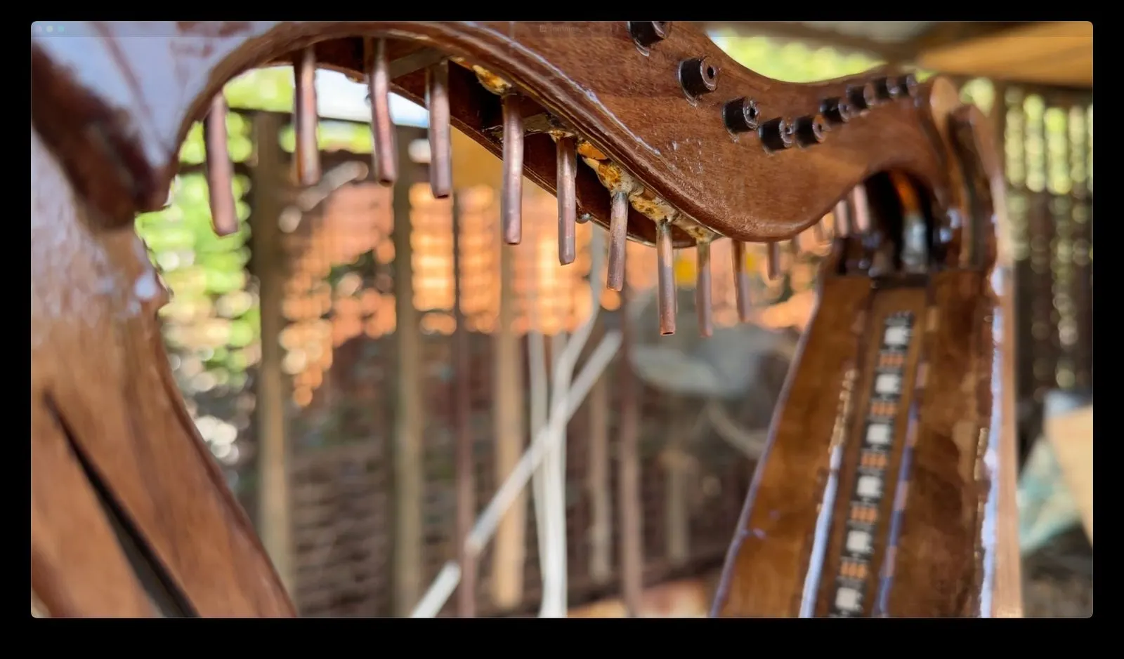 Animated Wooden Fountain: twenty-four outlet nozzles installed in the harp
