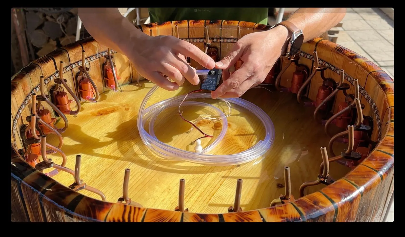 Animated Wooden Fountain: plumbing ring connected inside the basin